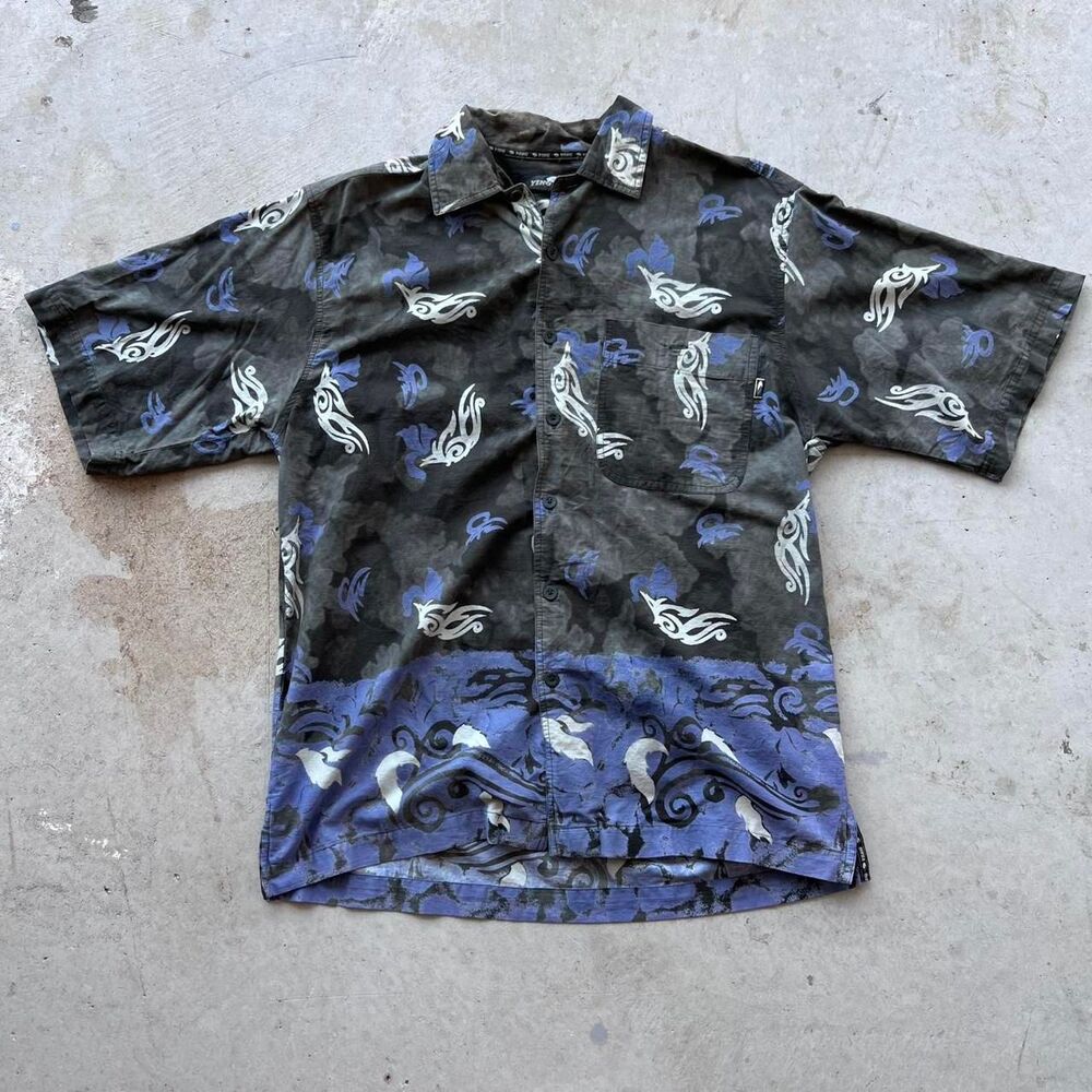 Ying Yang Hawaiian shirt with floral pattern and tribal design, featuring a blue